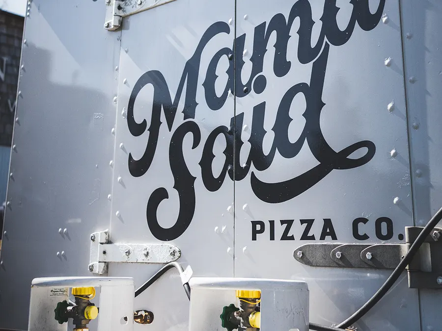 The Mama Said wordmark on the side of the food truck
